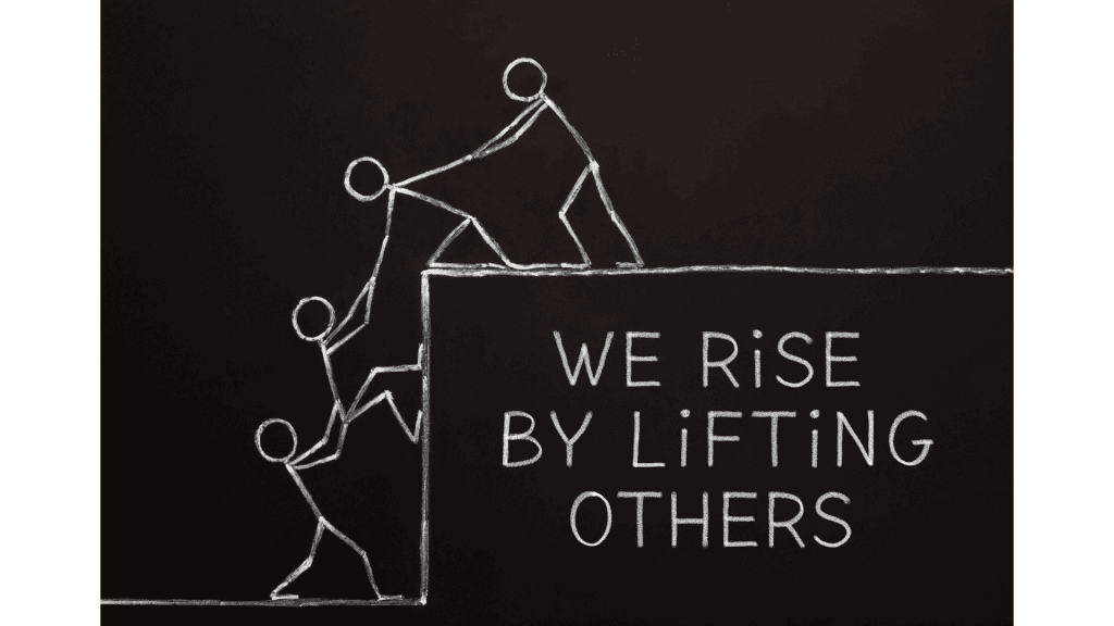 Image of a chalkboard drawing of stick figures helping each other rise up over a high wall and the words "We Rise By Lifting Others"