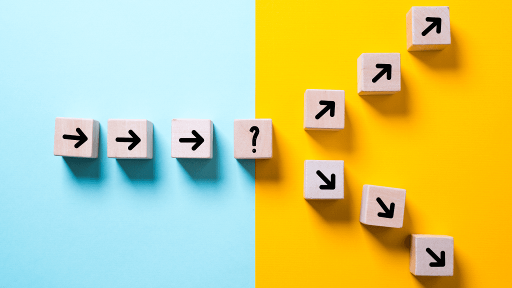 Image of blocks with arrows leading from left to right until they meet a block with a question mark, then diverge into to paths leading up and down on an angle. Signifying the value of design thinking for SMBs to test and learn before making big decisions.