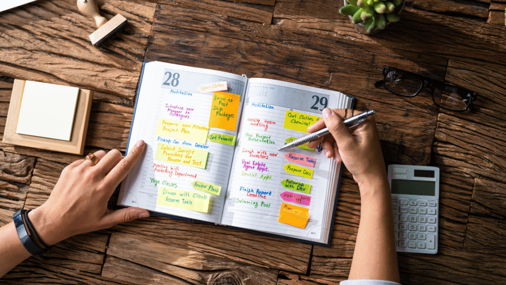 Image of a daily planner with the user checking and "preflecting" on the upcoming activities to be ready for the day.